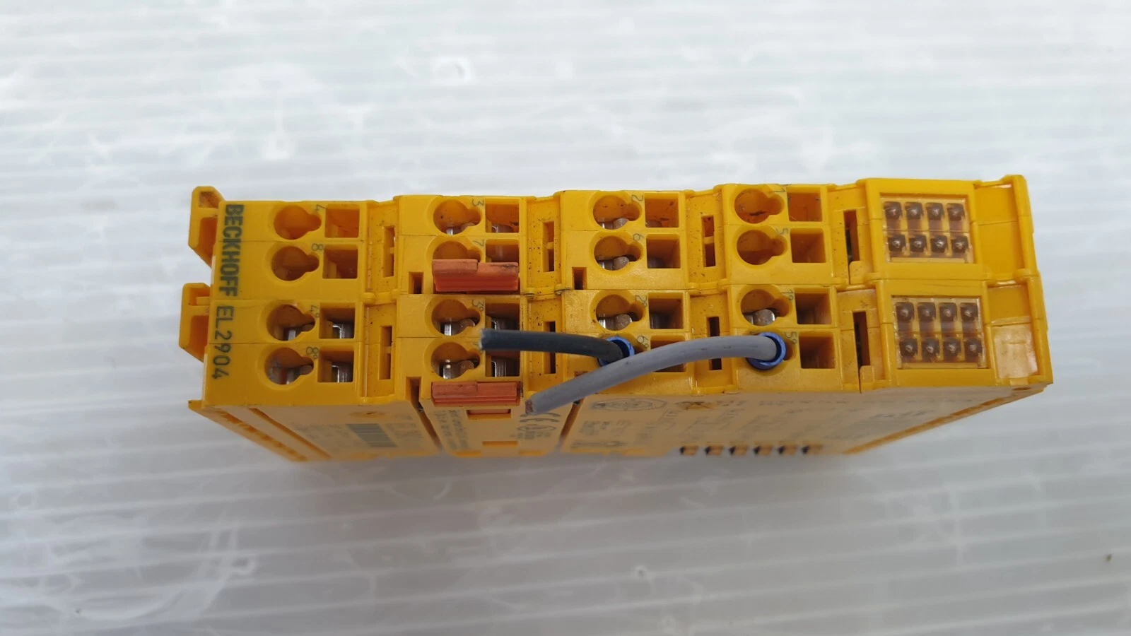 Top of the EL2904 showing terminal points, LED windows and wires