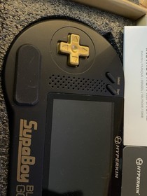 Hyperkin SupaBoy Portable Pocket Black Gold Console Two Carts Retro Gaming SNES
