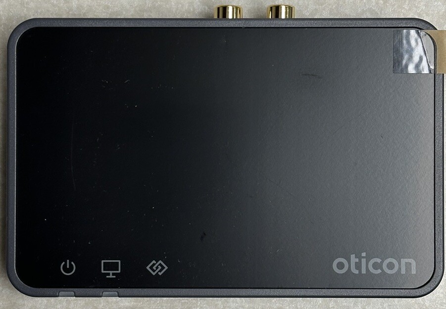 Oticon TV3 Bluetooth box. All Cables included.  Very Lightly