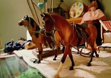 accurate scale Breyer horse  with leather saddle and tack made by saddle maker