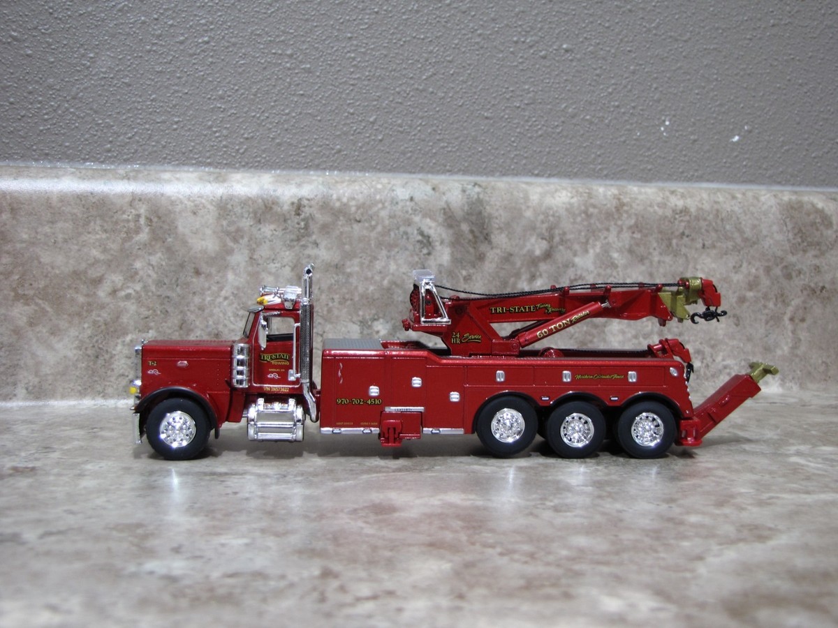 DCP 1/64 Red Tri-State 389 Peterbilt Rotator Wrecker Semi Truck