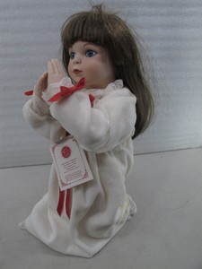 a christmas prayer porcelain doll