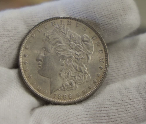 1886 US Morgan Silver Dollar $1 AU (Toned)
