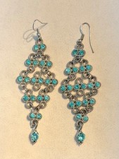 Crystal rhinestone chandelier earrings.