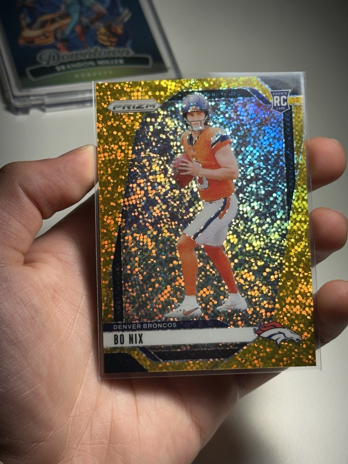 2024 Panini Prizm - Rookies Bo Nix #309 Gold Sparkle Prizm /24 (RC)