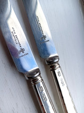 2 solid silver handled Atkin Brothers Sheffield 1954 butter knives.
