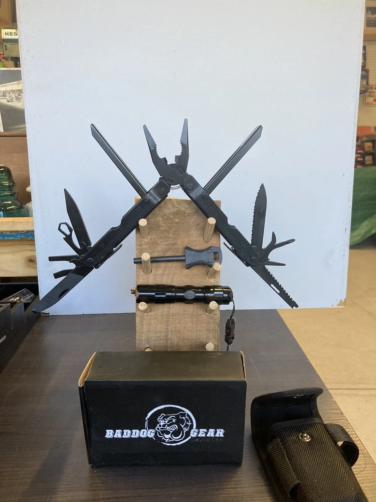 Multi-tool By Bad Dog Gear 10 Tool Including A Fire Starter And Led Flash Light.