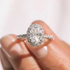 2.09CTW 9x7 mm Oval Cut Moissanite Halo Engagement Ring In 14k White Gold Plated
