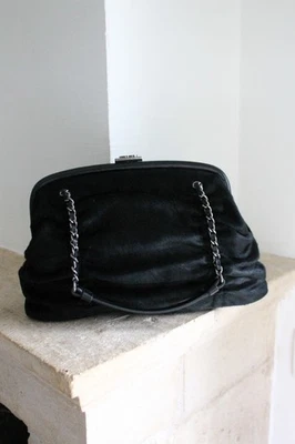 Chanel sac à main en cuir et poils de poulain noir - Photo 1/4
