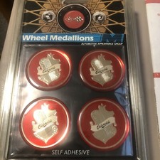 Vintage Oldsmobile Wheel Medallions In Package