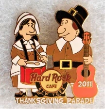 HARD ROCK CAFE NEW YORK PILGRIM COUPLE PLAYING DRUM & HOLDING GUITAR PIN # 64078