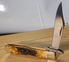 Case XX 6111 1/2L Cheetah Lock Back Knife SS Blade Jigged Bone Swing Guard