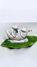 Latex and Fibreglass Mould Frogs in a Boat