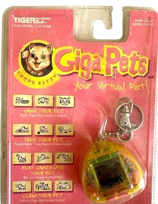 1997 Giga Pets Compu Kitty Yellow Virtual Pet NEW Sealed Tiger Electronics