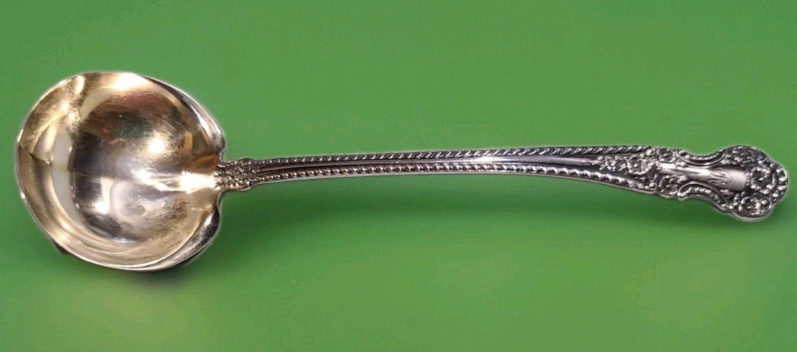 Antique Gorham "Cambridge" sterling silver cream ladle w gold wash bowl, ca 1899