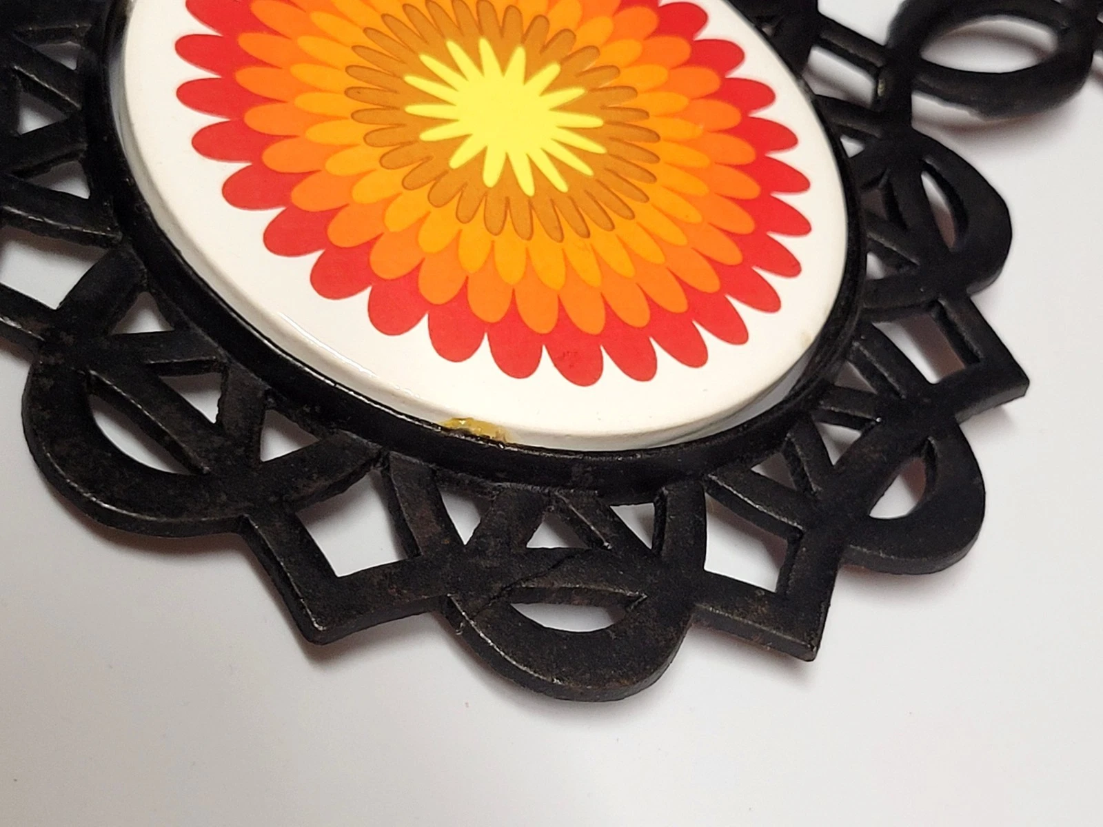 vintage 1970s psychedelic floral cast iron trivet and hot pad - product detail image 9