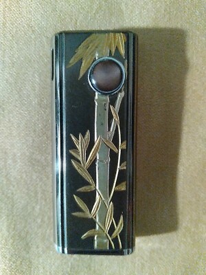 win cigarette lighter WIN cigarette lighter With Etched Bamboo Leaves