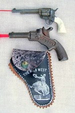 2 SMALL TOY AMERICAN OLD SINGLE SHOT COWBOY CAP PISTOLS 1 WITH HOLSTER