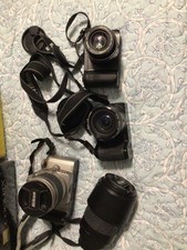 camera lot untested 2 digital 1 film with extra lens Nikon and Cannon