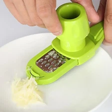 Multifunctional Manual Garlic Crusher Ginger Grater Cutter Peeler Kitchen Tool