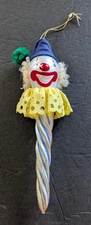 Vintage De Carlini Italian Clown Face Swirl Icicle Christmas Glass Ornament.