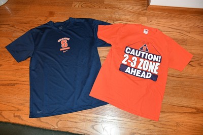 orange and navy blue nike shirt