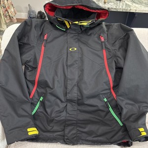 Oakley Rasta Snowboard Jacket Black With Red,Green, and Yellow Accents Size L