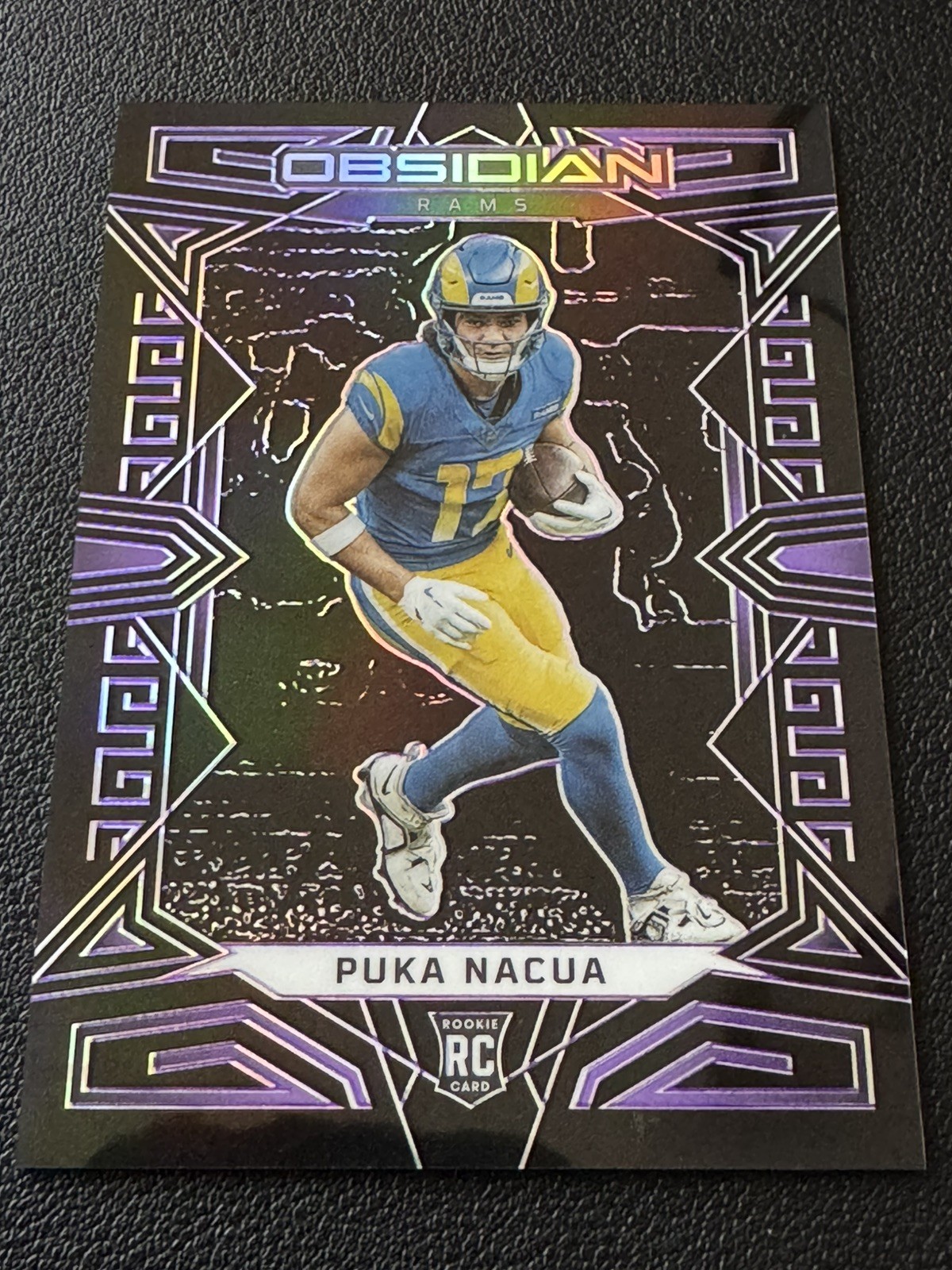 PUKA NACUA ROOKIE PURPLE ELECTRIC ETCH /75 2023 PANINI OBSIDIAN LA RAMS RC