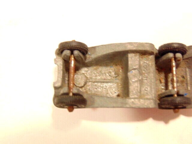 old die cast pink metal Tootsie Toy car, marked 