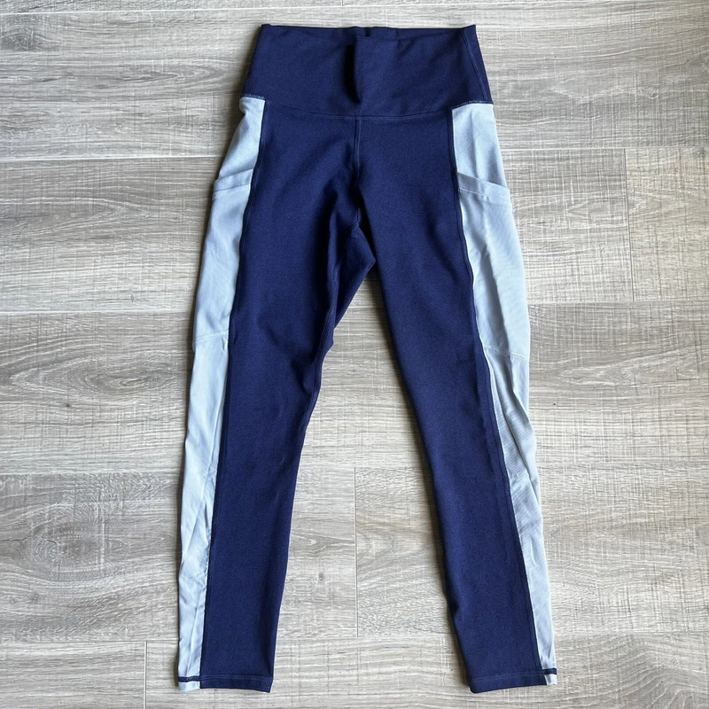 fabletics two tone mesh cropped side pockets mid rise leggings