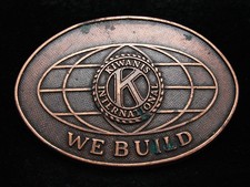 OG11141 VINTAGE 1970s KIWANIS INTERNATIONAL WE BUILD COPPERTONE METAL BUCKLE