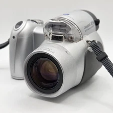 KONICA MINOLTA DiMAGE Z10 3.2MP Digital Camera - Silver 8x ZOOM - 9835