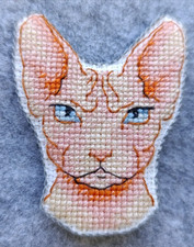 Handmade cross-stitch brooch, "Sphynx cat"