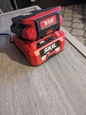 SKIL PWRCore 40V 2.5 Ah 1-Pack Lithium Ion Battery BY8705-00 and charger