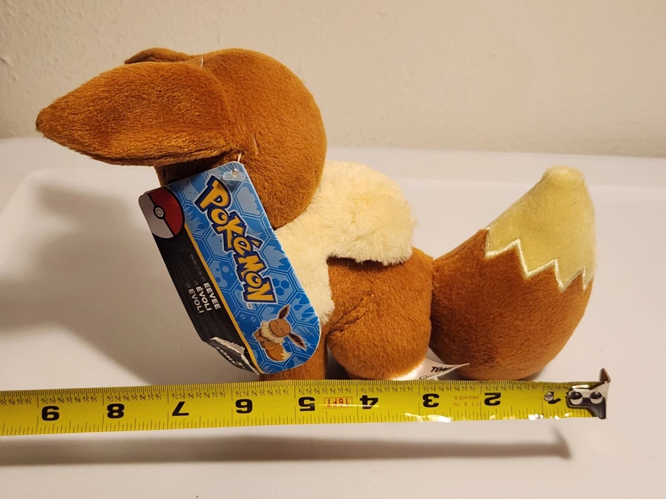 NUEVO con etiquetas Tomy 2016 Pokemon EEVEE EVOLI Peluche 7" Ojos cerrados Sonriente Lindo Foto 2 de 4
