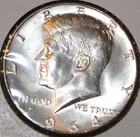 1964 Kennedy Half Dollar - Uncirculated With Reverse Toning