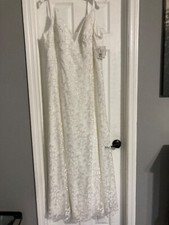 Brand new never been worn A-Line wedding dress with leaf detail wedding cape 