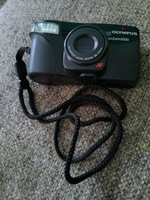 Olympus Infinity Zoom 25 mm Camera With Filter, Booklet, And Case.