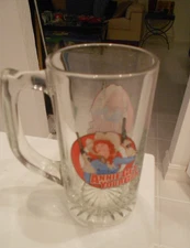 ANNIE GET YOUR GUN GLASS WITH HANDLE-VERY GOOD CONDITION-5 1/2" HIGH