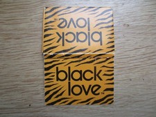Black L.  Zigarettenpapier, cigarette paper, papel de fumar, papier a cigarettes