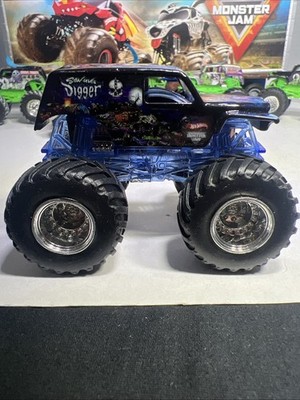 HOT WHEELS Monster Jam Truck  SON UVA DIGGER Off Road Edge Glow Roll Cage 1:64