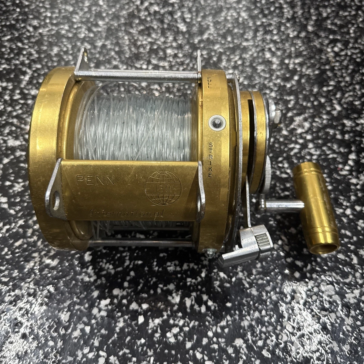 Preços baixos em Penn International 130 Molinetes de pesca para
