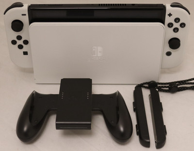 Nintendo switch OLED W/ dock and joycon grips