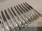 20th c Swiss 800 silver (handles) 11 dessert knives Net Jezler 21cm