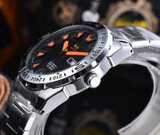 5Sports Style Quartz Men Watch Black Dial Orange Markers Day Date Steel Bracelet