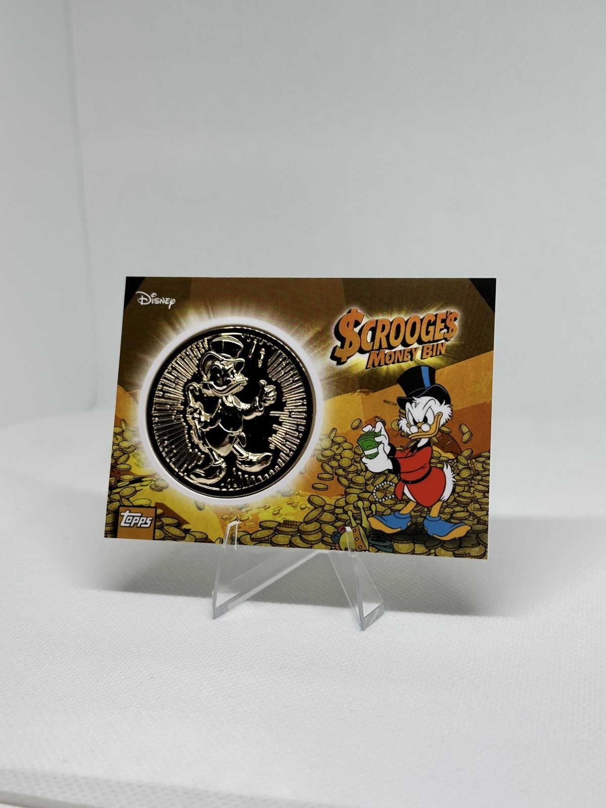Disney 2026  Topps Neon Scrooge's Money Bin Scrooge McDuck Metal Coin Relic