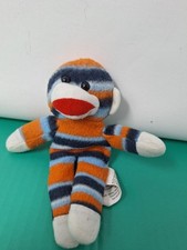 Generic All Port Sock Monkey, Multi Colored, Used.