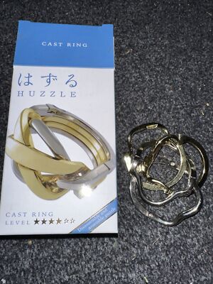 Hanayama Huzzle Schloss Puzzle Ring Level 4 Verpackt
