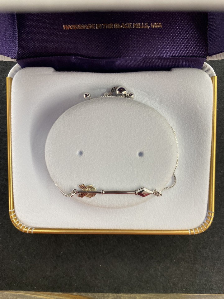 Black Hills Gold sterling silver and gold arrow bracelet by Landstroms, read.... eBay