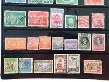 Carribean stamps - very old - on new pages 100 + stamps